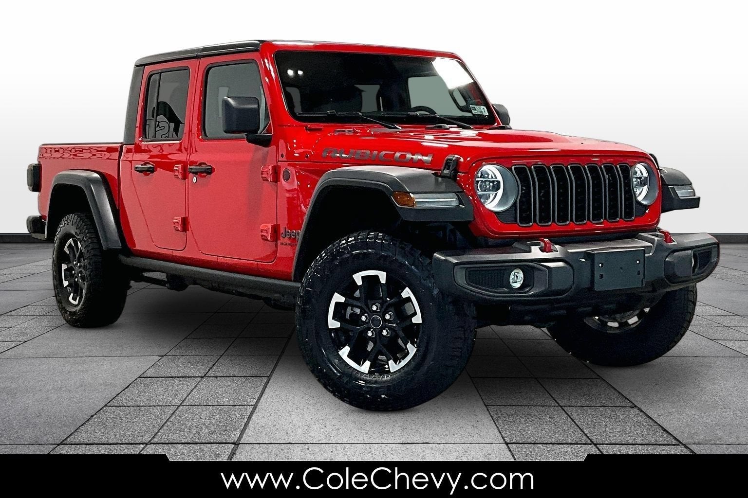 2026 Jeep Gladiator Rubicon in Red — front three-quarter view