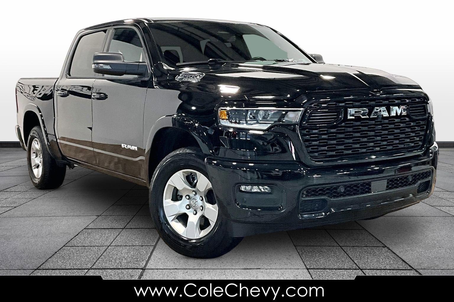 2025 RAM 1500 Big Horn in Black — front three-quarter view