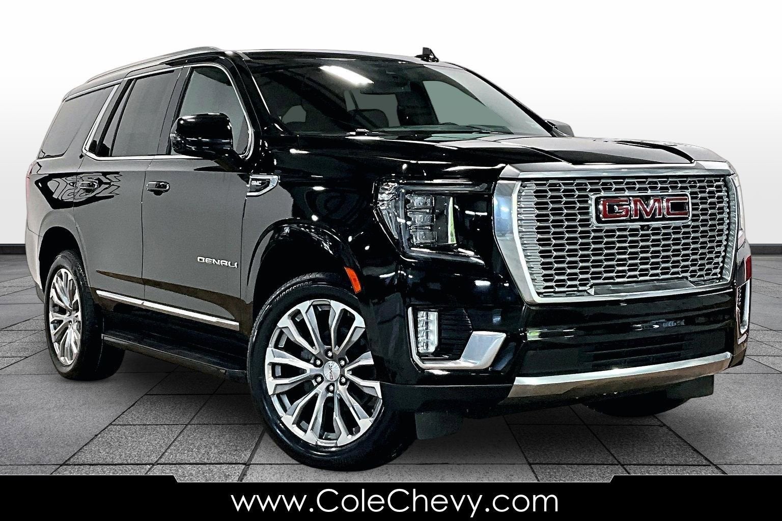 2024 GMC Yukon Denali in Onyx Black — front three-quarter view