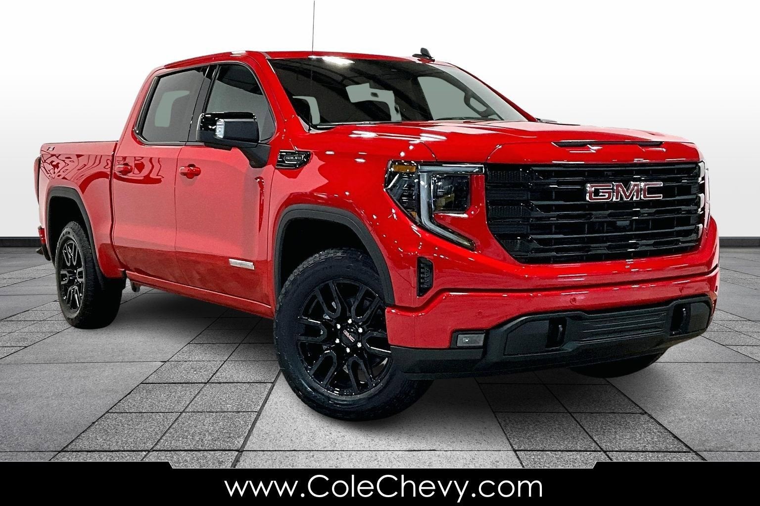 2026 GMC Sierra 1500 Elevation in Cardinal Red — front three-quarter view
