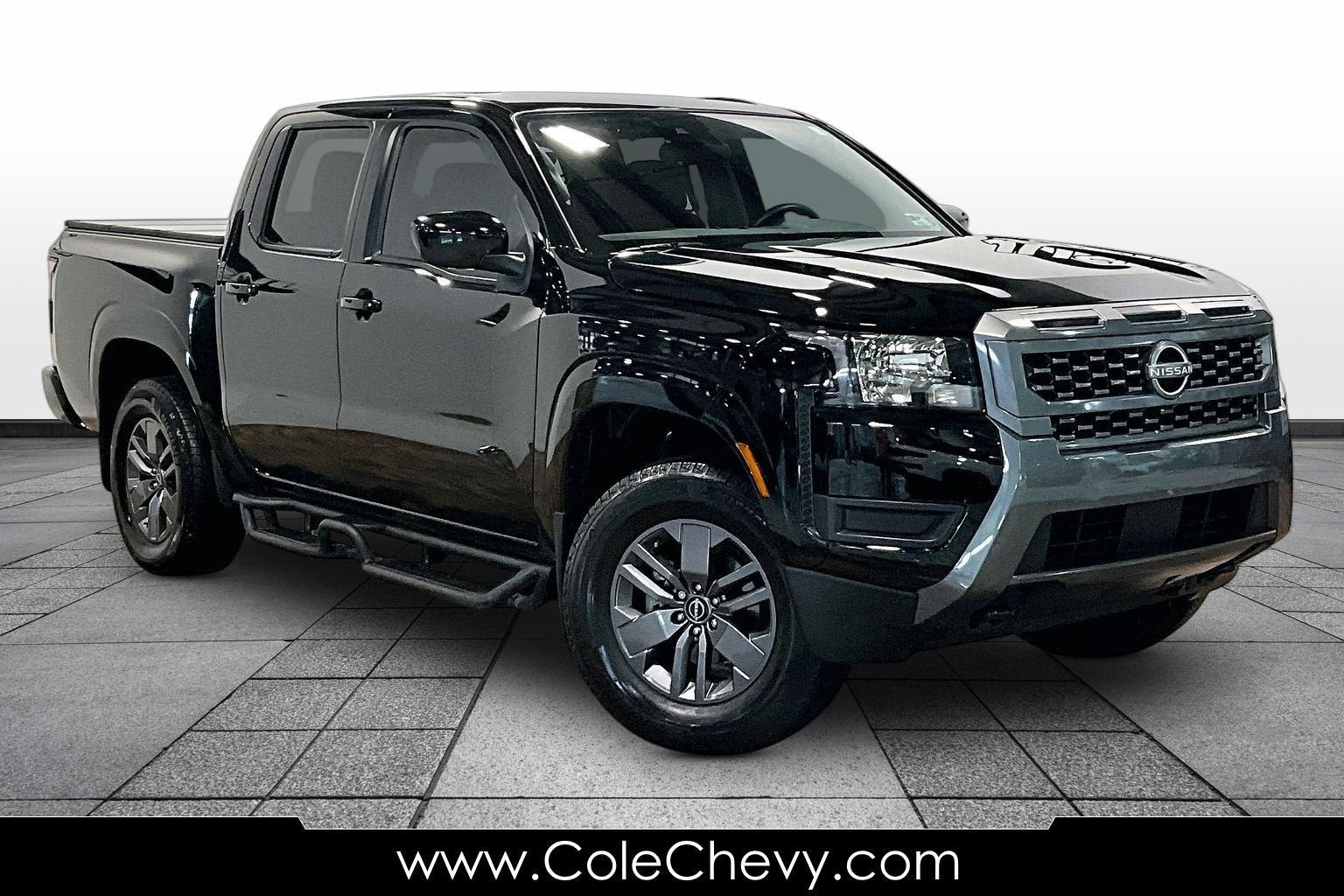 2025 Nissan Frontier SV in Other — front three-quarter view