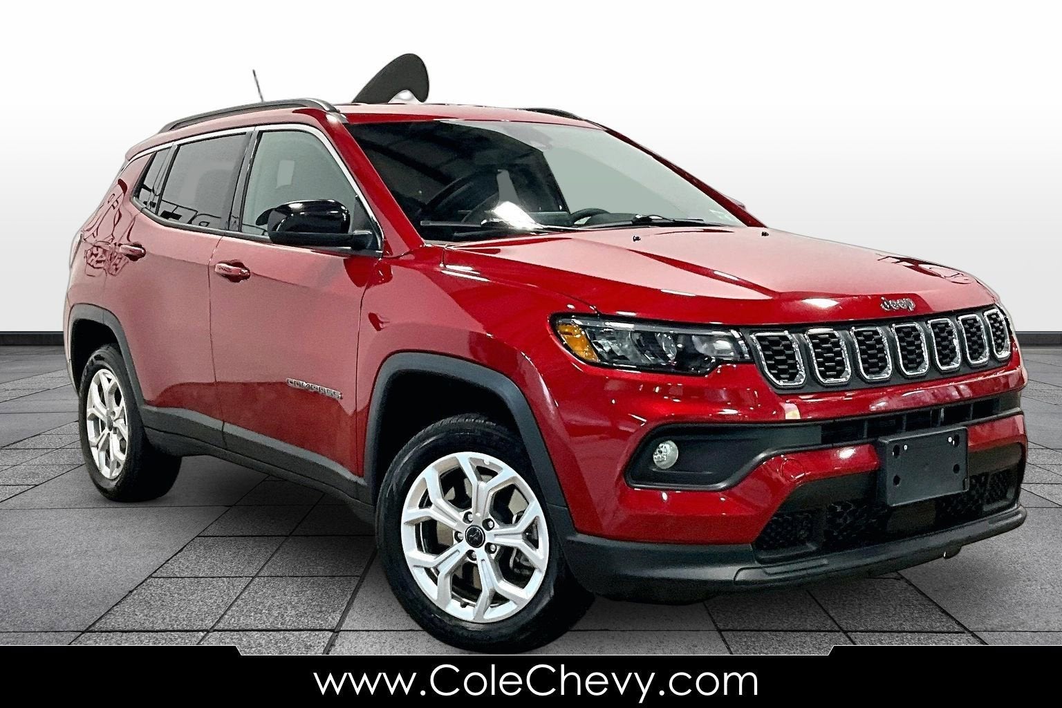 2025 Jeep Compass Latitude in Red — front three-quarter view